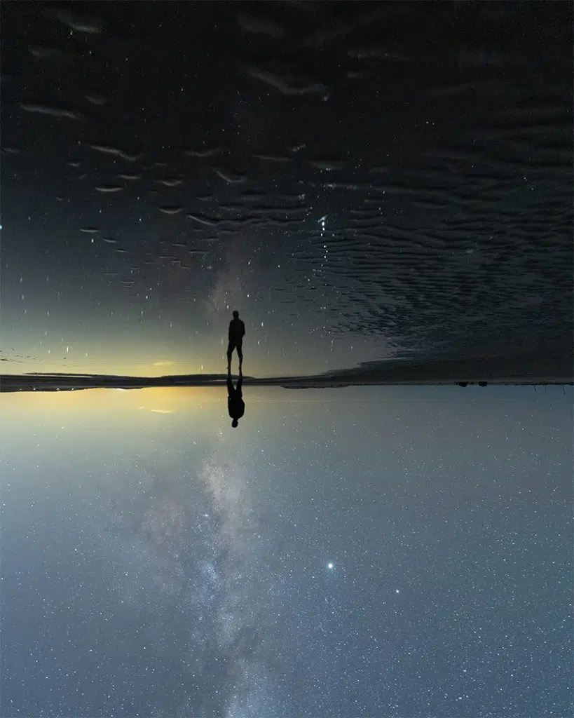 person standing under stars