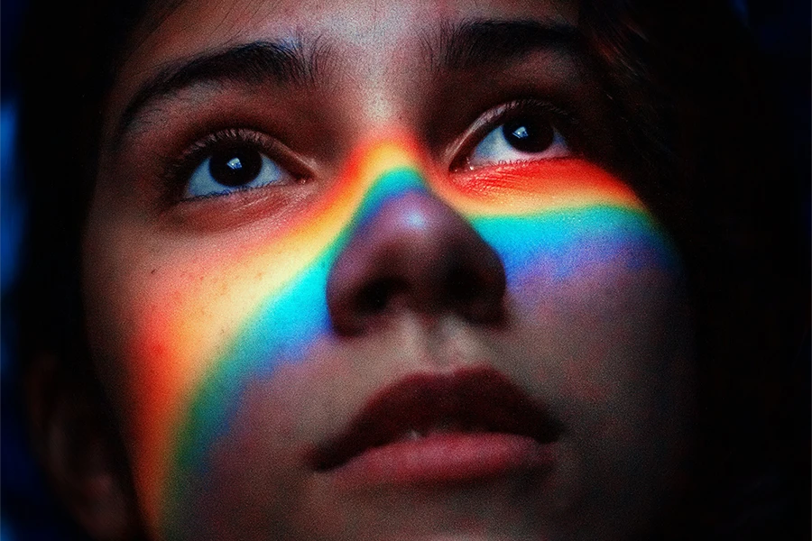 image of face with rainbow on it