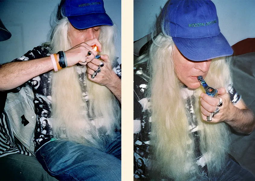 image of Carlo McCormick smoking a cannabis pipe