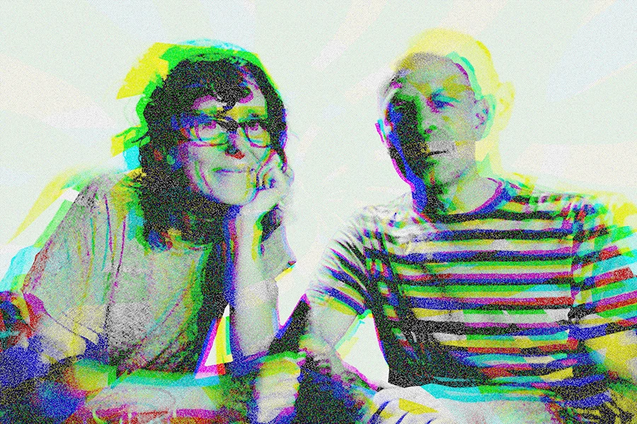 glitchy photo of man and woman sitting next to each other