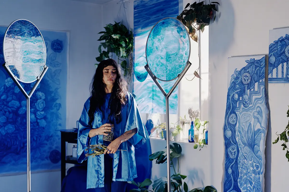 Person standing between mirrors