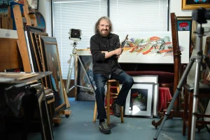 Photo of Man in Artist Studio
