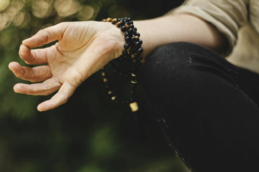 Close up of hand in meditative position