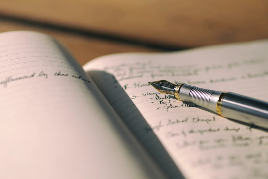 Close up of journal with pen