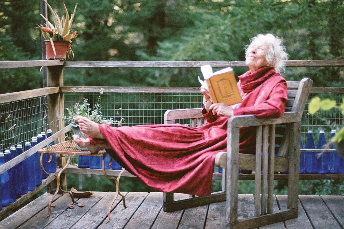 Woman Reading a Book Looking at Sky Blissfully