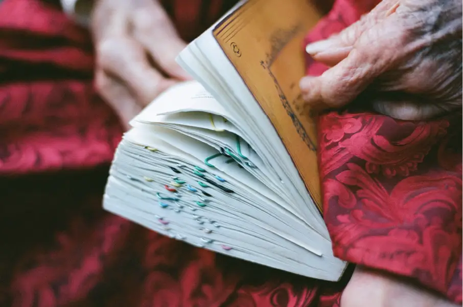 Close up of Hands Holding Book