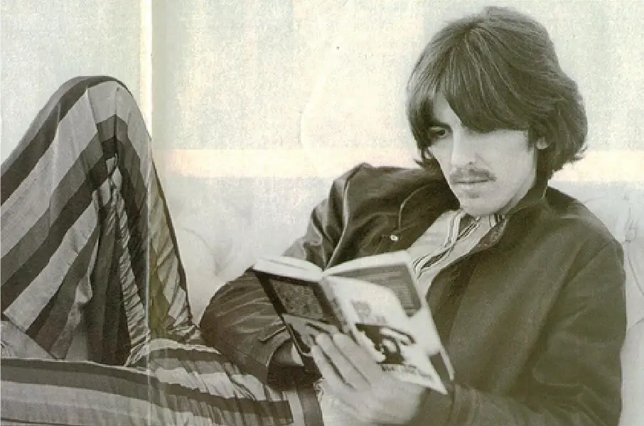 Photo of George Harrison Reading a Book