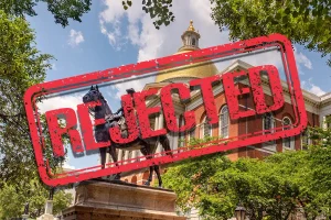 Photo of Massachussetts Capital Building with REJECTED Stamp Overlaid